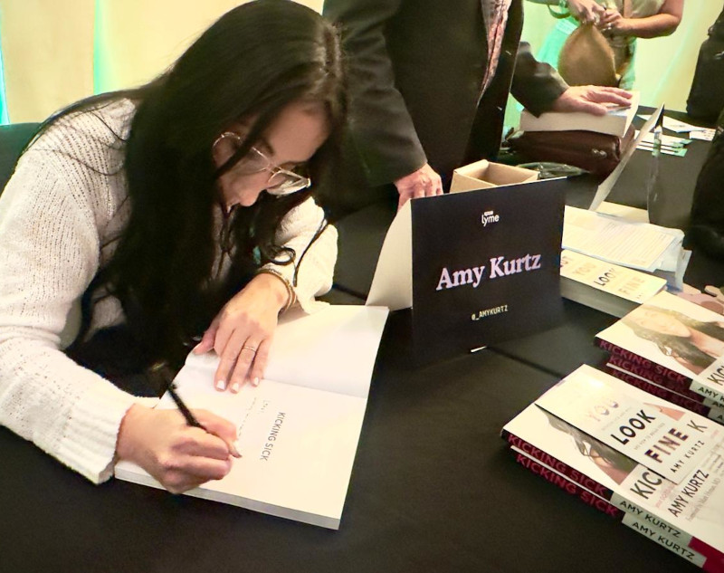 Amy Kurtz Signing a Book