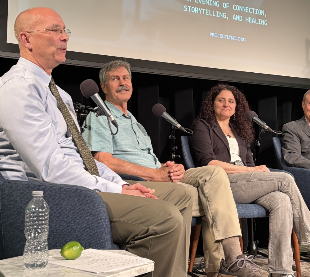 Rich Johannesen from Tick Boot Camp, Doctor Bill Rawls, and Nicole Bell sitting during the Authors Panel