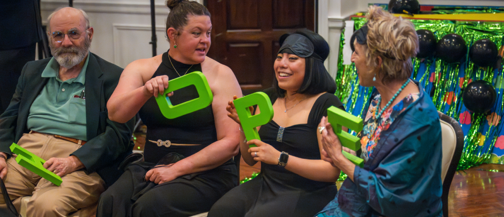 Guests participating in games during the Lyme Warrior gala