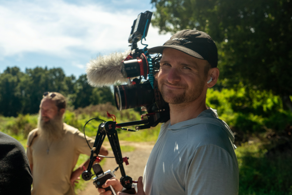 Tick Bombs and an Invasive Tick: What Tick Boot Camp and Researchers Found While Dragging for Ticks on Long Island 9 Documentary director Reece Robinson recording researchers conducting tick drags at Malik Farms on Long Island