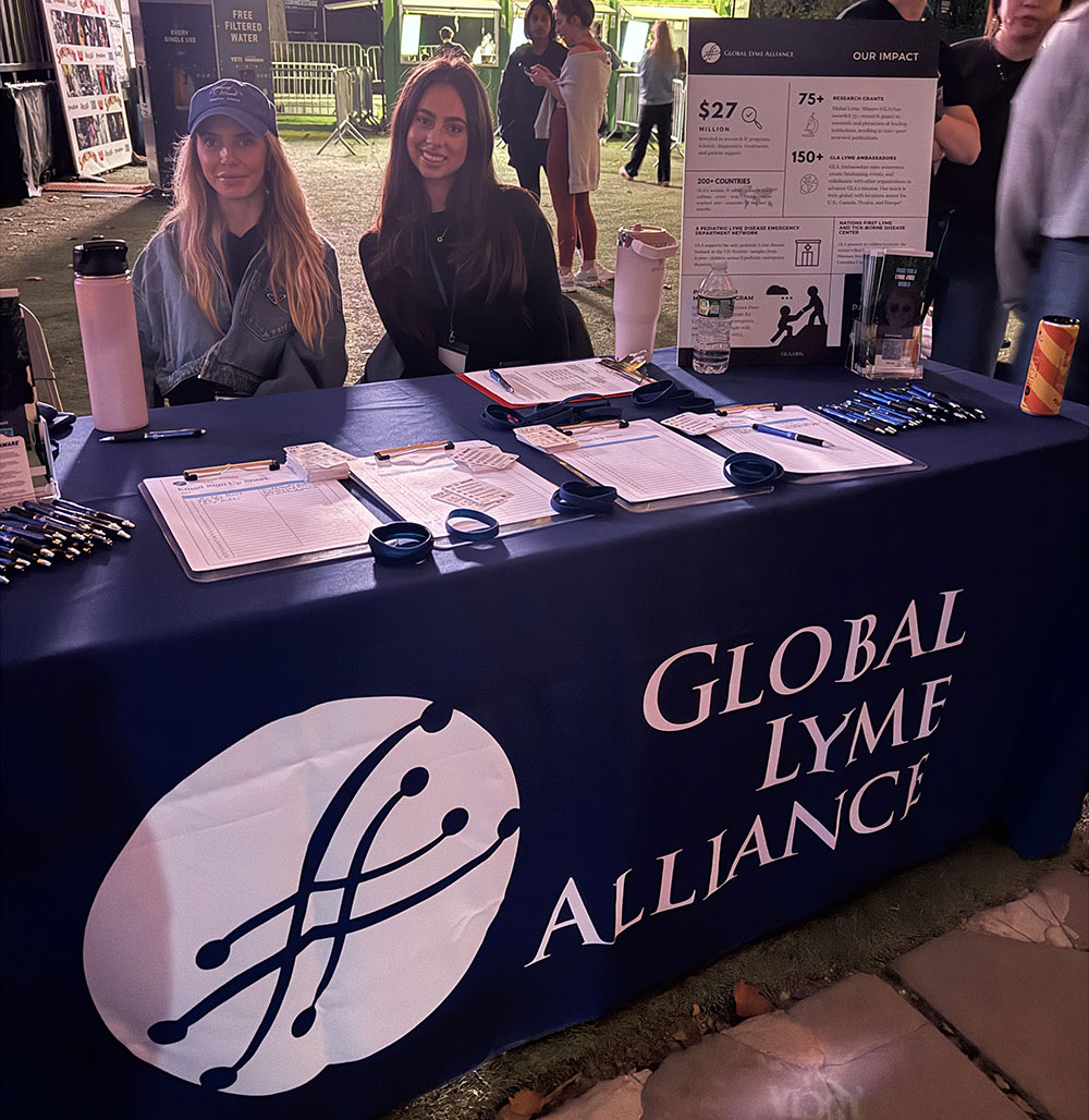 Music for Action Brings Lyme Disease Awareness to Central Park with Young the Giant & St. Lucia 7 Global Lyme Alliance ambassadors Kat Silver and Lindsey Smith staffing the GLA booth at Music for Action in Central Park