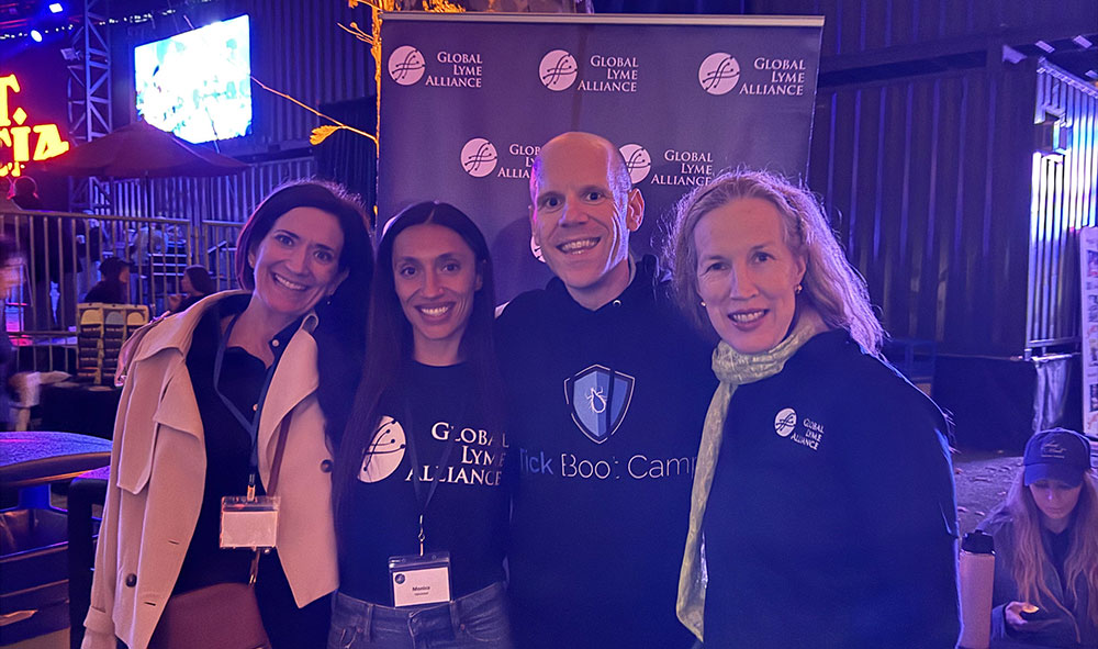 Music for Action Brings Lyme Disease Awareness to Central Park with Young the Giant & St. Lucia 8 Kristen Harris, Monica Cipriani, Tick Boot Camp co-founder Matt Sabatello, and Rika Keck at the Global Lyme Alliance booth during Music for Action