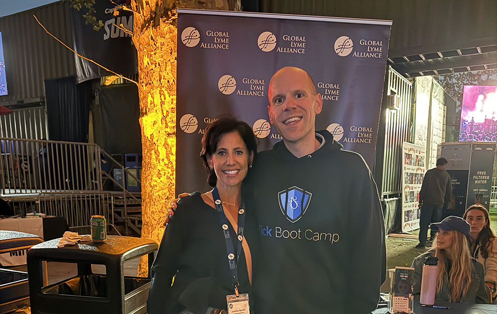 Music for Action Brings Lyme Disease Awareness to Central Park with Young the Giant & St. Lucia 10 Tick Boot Camp co-founder Matt Sabatello with Global Lyme Alliance CEO Jennifer Katritos at the GLA booth during Music for Action