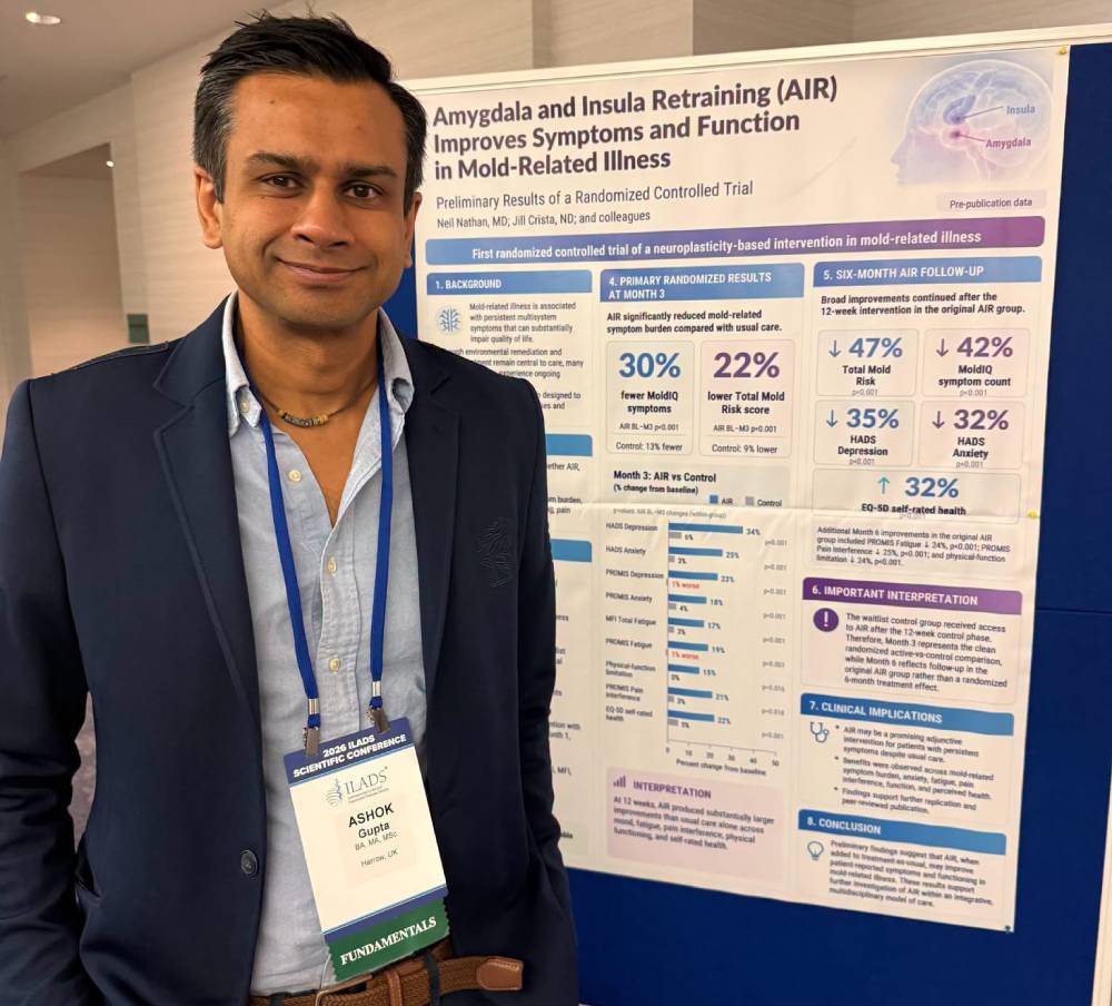 Tick Boot Camp at ILADS 2026: Official Podcast & Gala Emcees 13 Gupta Program founder Ashok Gupta beside his research poster on amygdala and insula retraining in mold-related illness.
